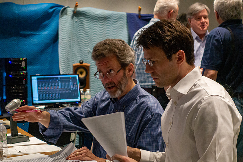 Blanton Alspaugh on left in blue shirt and James Blachly, choir leader